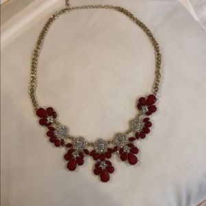 Gold tone and red sets with rhinestones necklace.